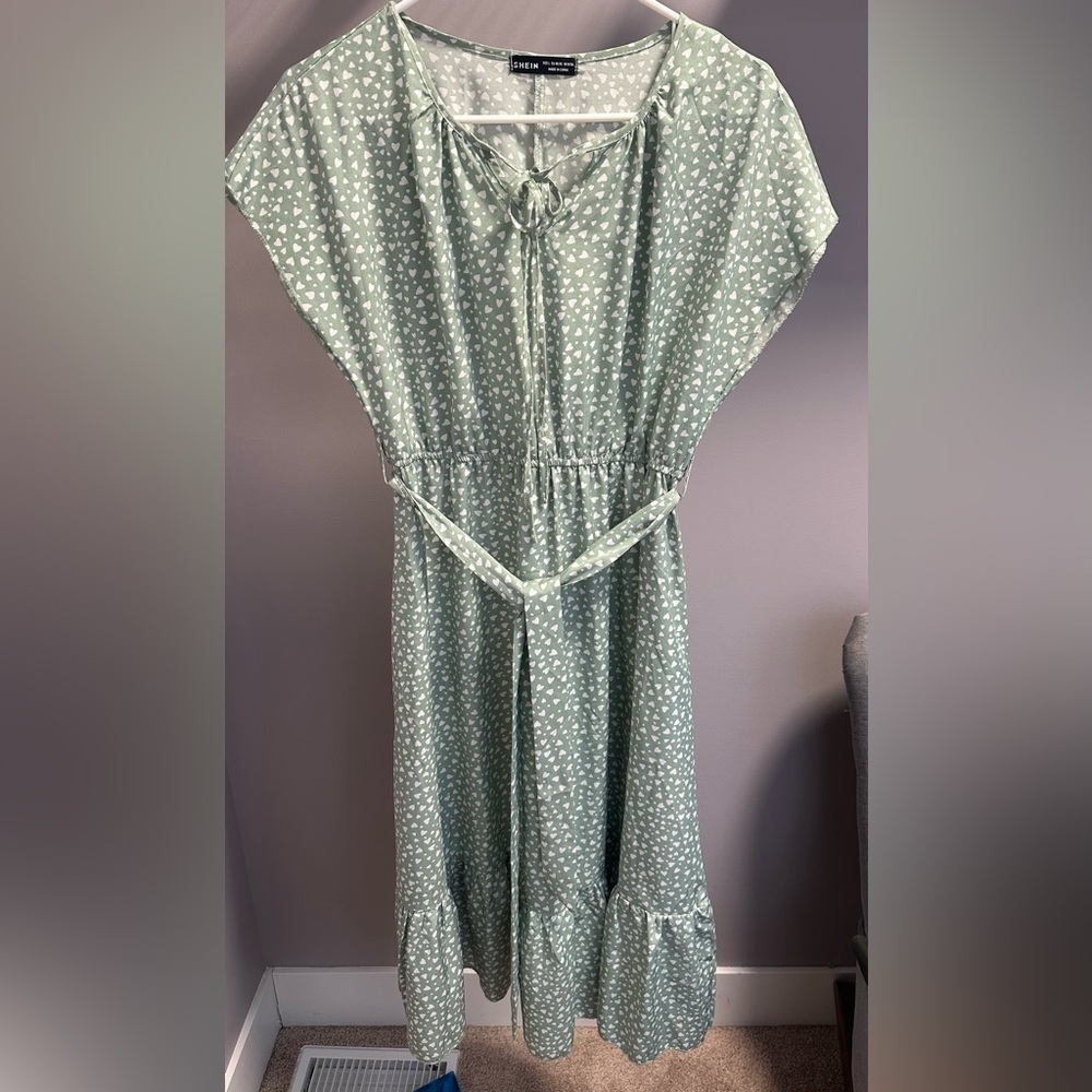 SHEIN size LARGE, Green Heart Pattern Dress With ruffled hemline.